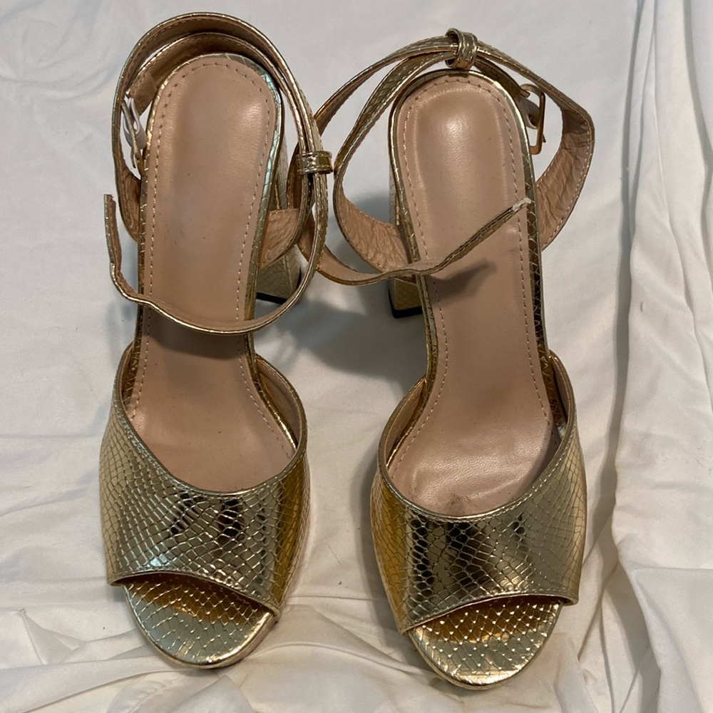 Gold high heels